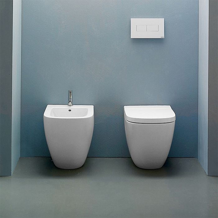 GLOBO Stone Унитаз напольный 56*36см, с системой скрытого крепежа, слив универсальный, цвет белый