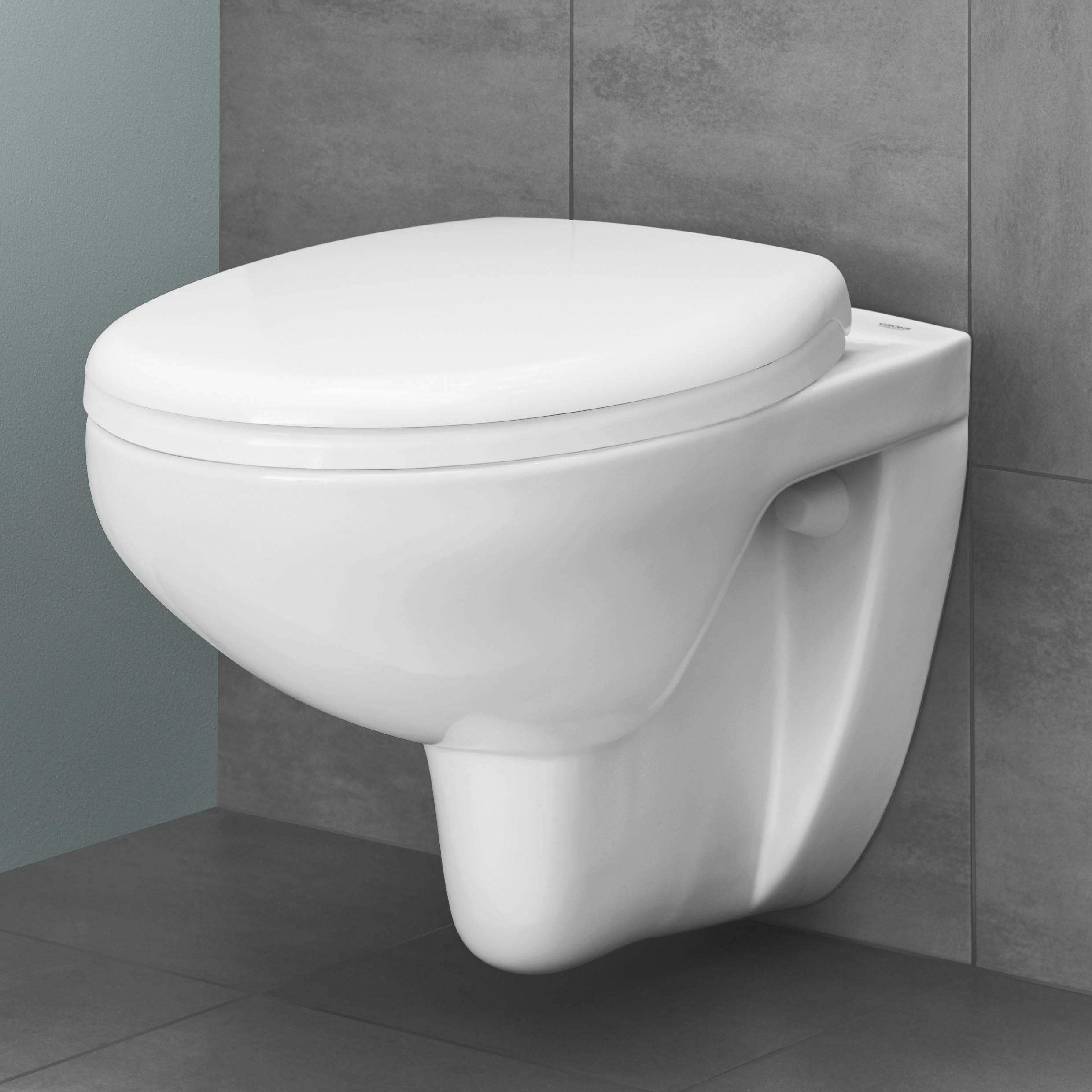 Унитаз подвесной безободковый GROHE Bau Ceramic с сиденьем с микролифтом (NW0005) Унитаз подвесной безободковый GROHE Bau Ceramic с сиденьем с микролифтом (NW0005)