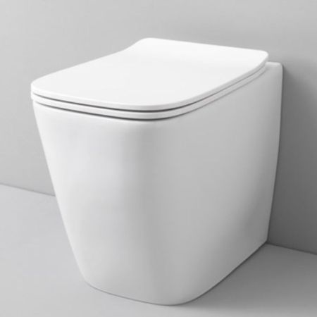 Artceram A16  Унитаз безободковый, напольный приставной слив универсальный  36х52 см, с креплениями,  цвет белый.