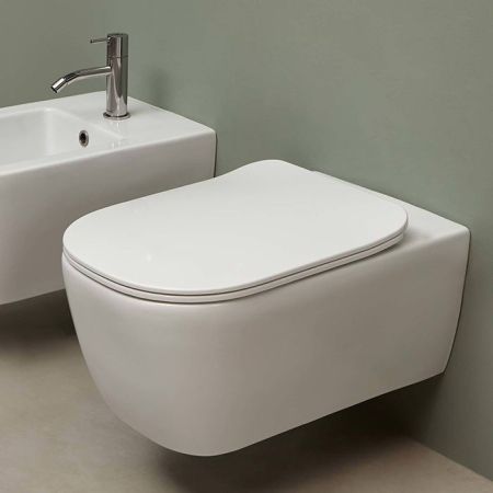 ANTONIO LUPI KOMODO Унитаз подвесной безободковый 540х360х260 мм., с крышкой-сиденьем FLAT с механизмом "soft-close", цвет белый матовый